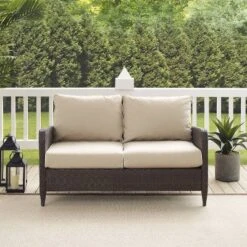 Kiawah Outdoor Wicker Loveseat Beige - Crosley -Sunnydaze Decor Store GUEST 34770989 5fdd 4f65 ae25 2932021c1ace